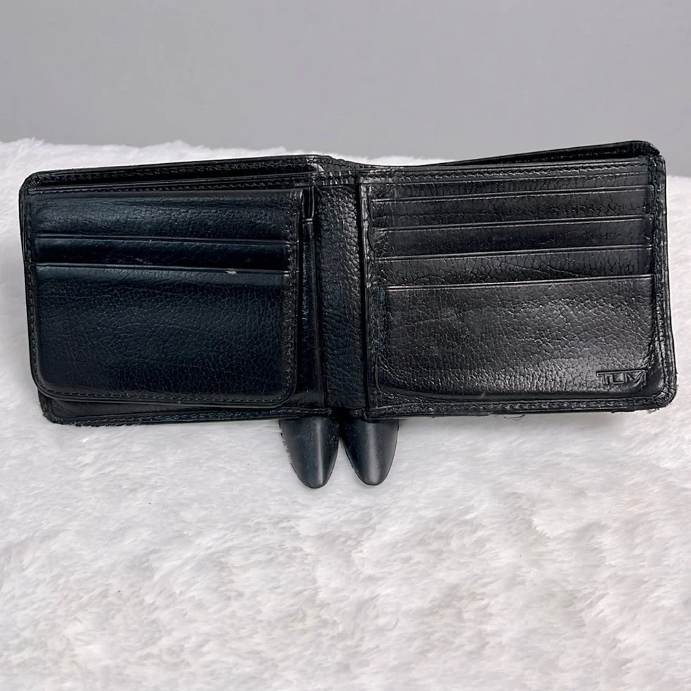 Tumi black leather